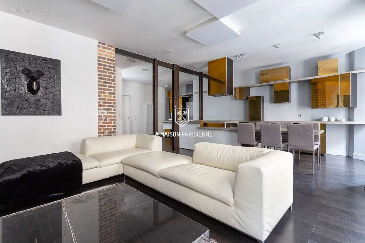 Appartement Paris 2 pièce(s) 62 m2 - photo 2