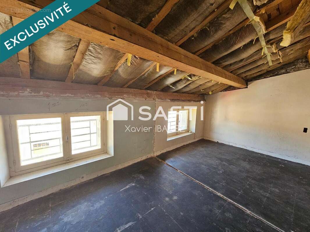 Photo 3 - Appartement à LE MALZIEU-VILLE