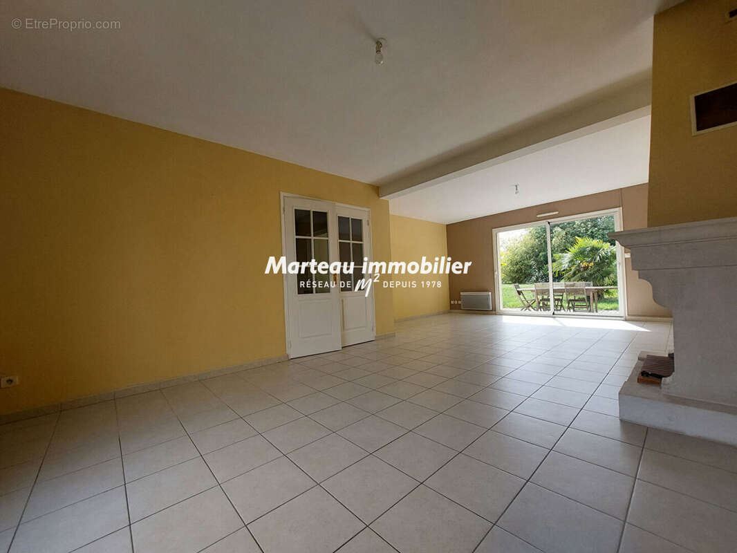 Maison à YVRE-L'EVEQUE