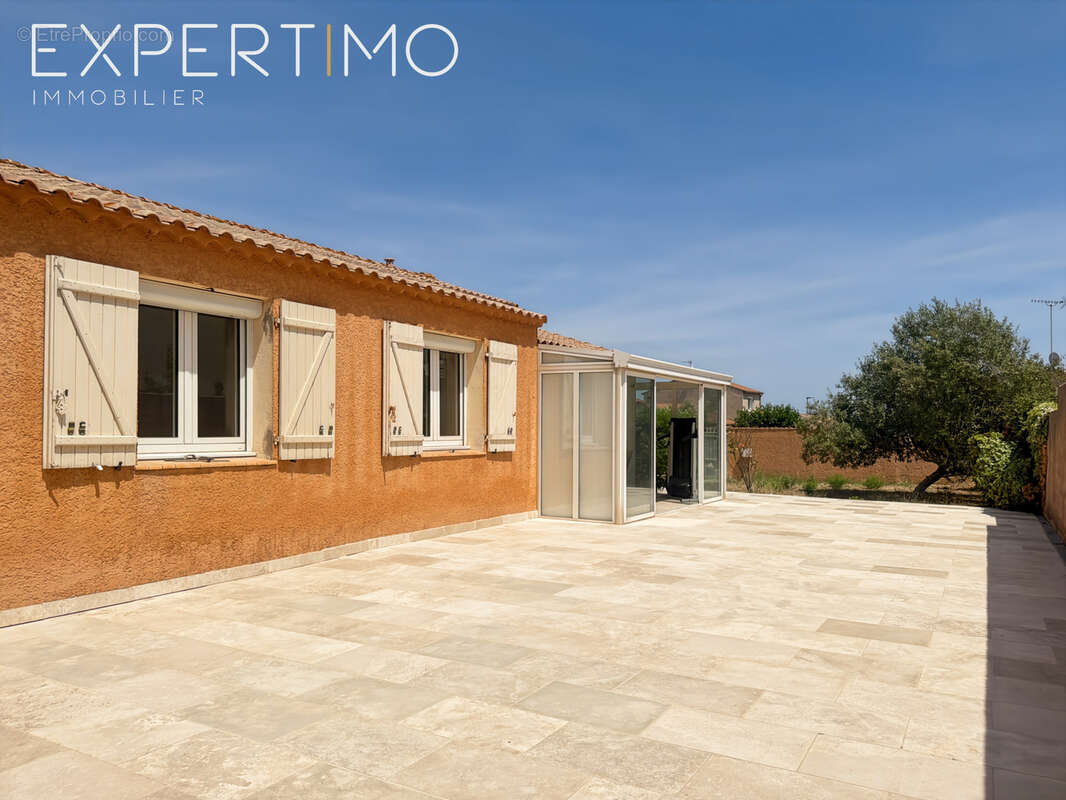 Maison de plain-pied de 114 m2 avec véranda, grand garage de 41 m2 - photo 3