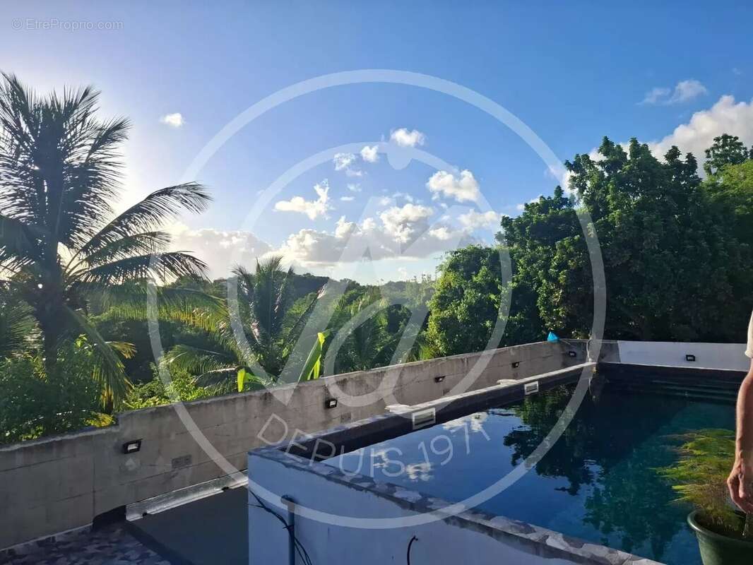 À vendre  1 029 000 € – Grande maison familiale & investissement locatif – Le Gosier - photo 6
