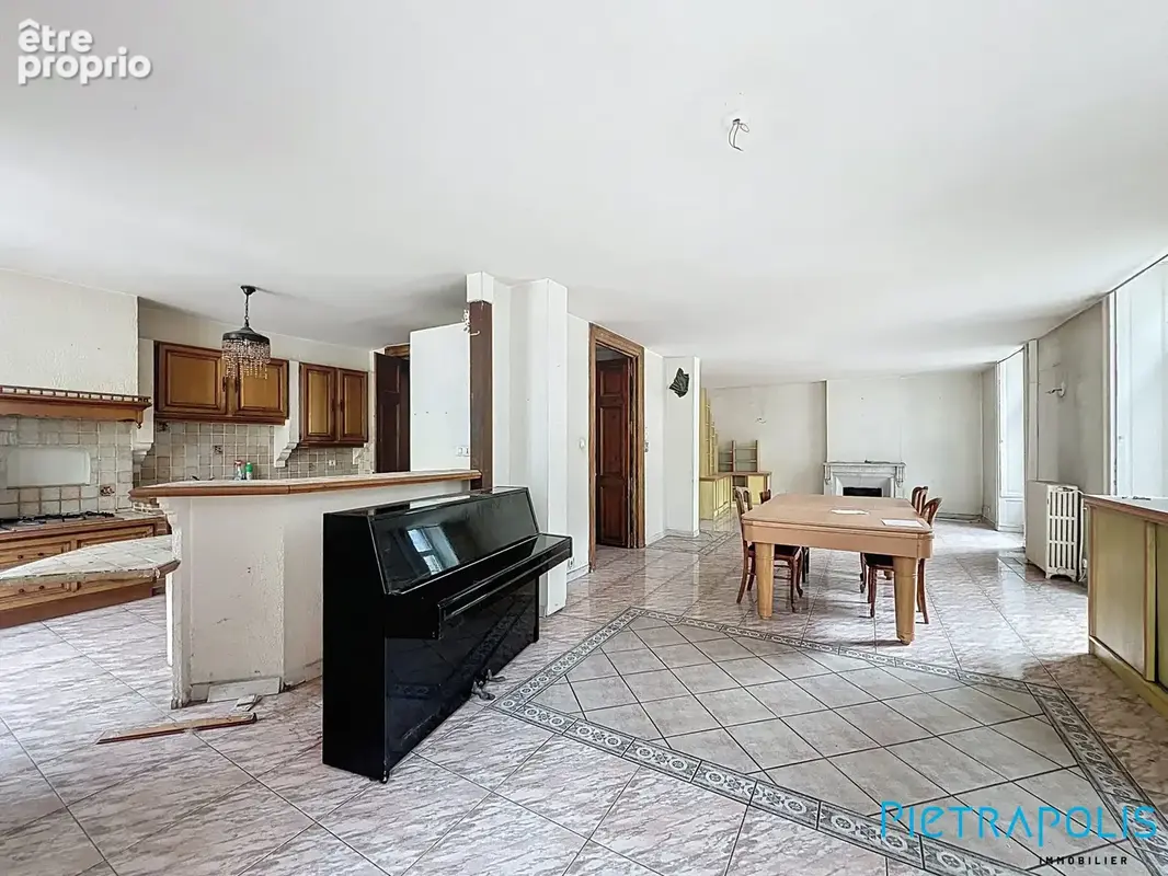 Salon / Séjour avec cuisine  - Appartement à MONTPELLIER