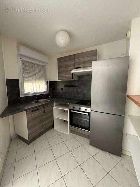 la cuisine est aménagée et équipée - Appartement à BOULAZAC