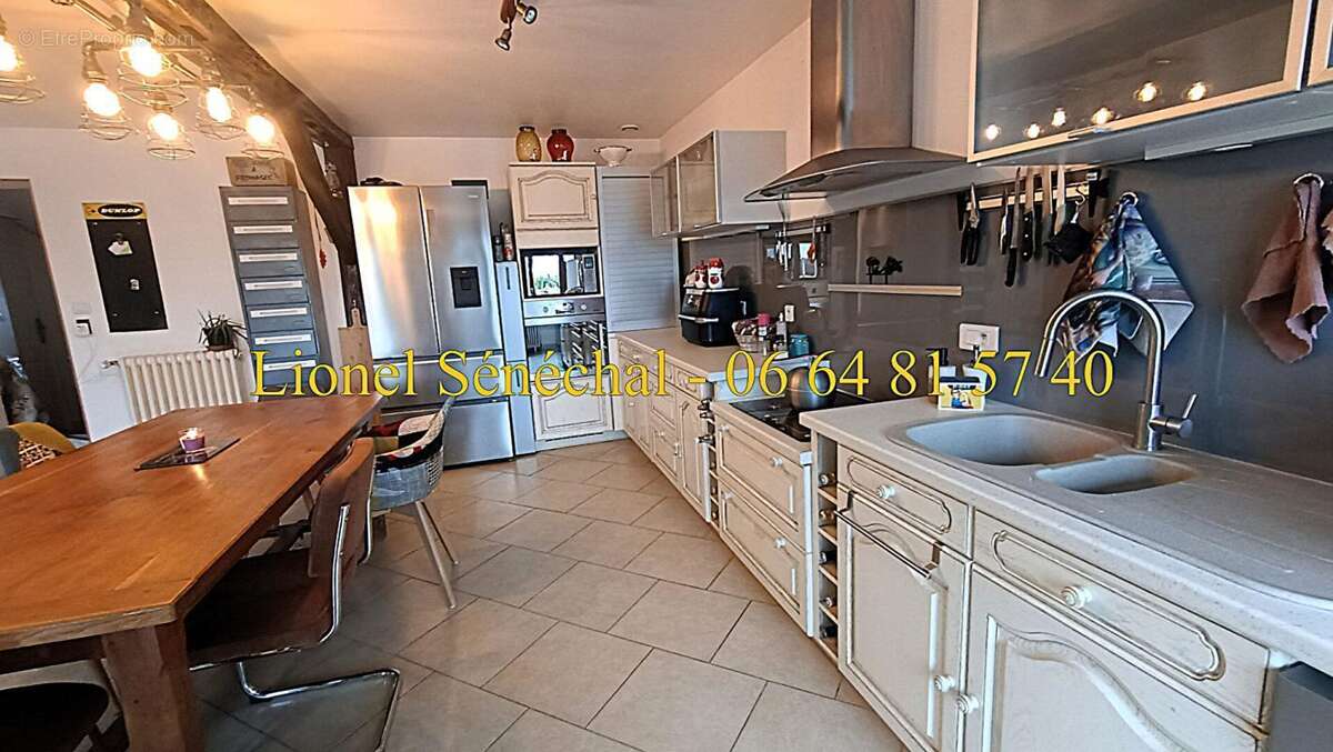 Maison à SAVIGNE-L'EVEQUE