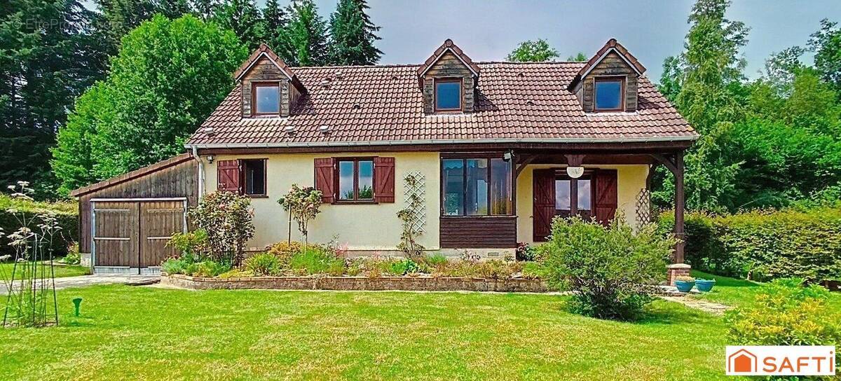 Photo 1 - Maison à LA MADELEINE-BOUVET