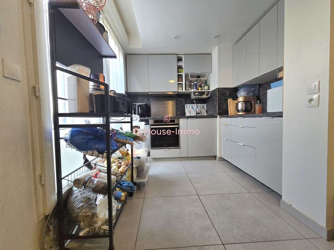Appartement 4 pièces 86 m² à vendre à Stains (93240) - photo 2