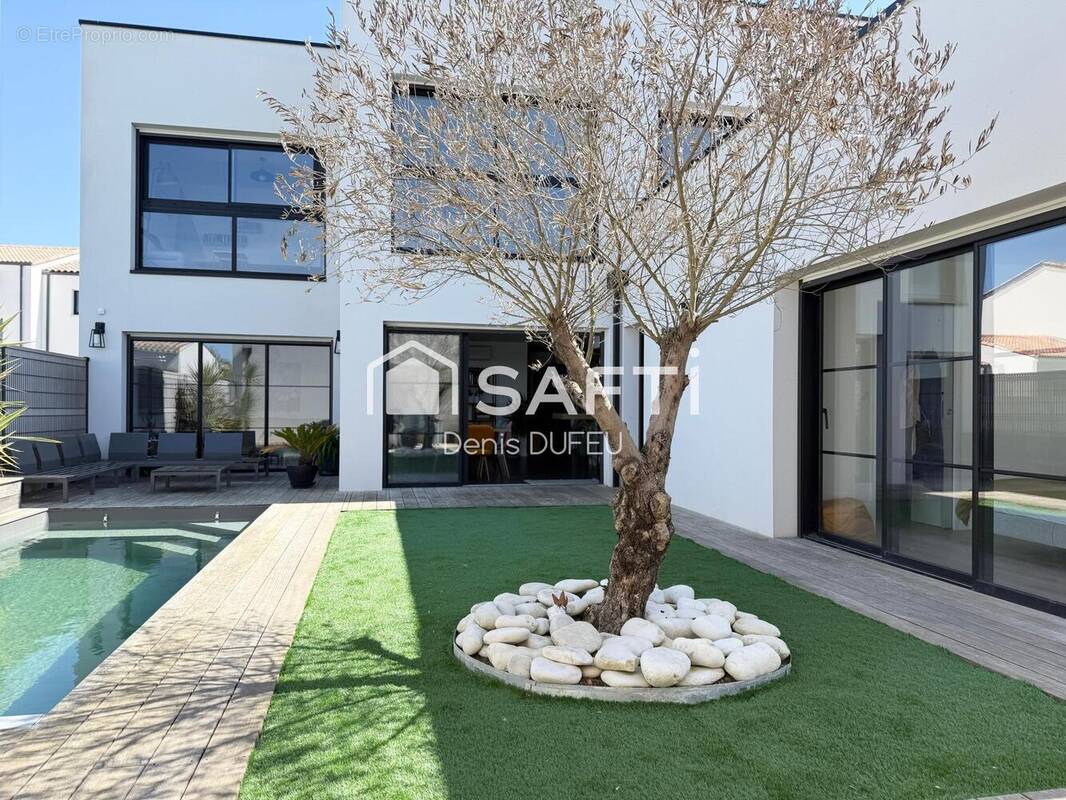 Photo 1 - Maison à PUILBOREAU