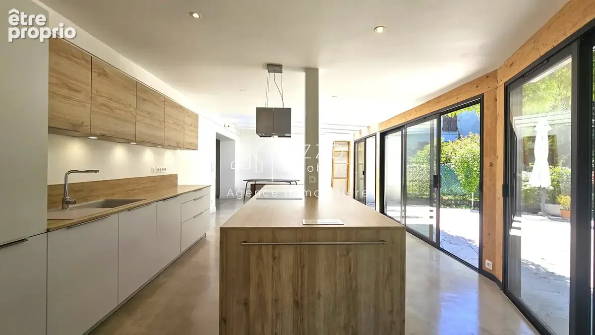 Divonne, duplex en RDJ de 225m2 de type 6 dans ferme Gessienne rénovée - photo 4