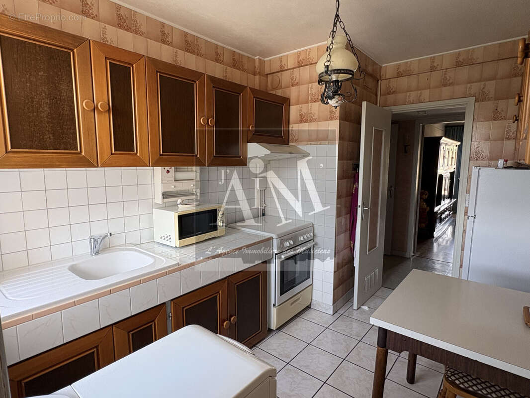 Appartement 3 pièces traversant avec balcon, parking et cave - photo 9