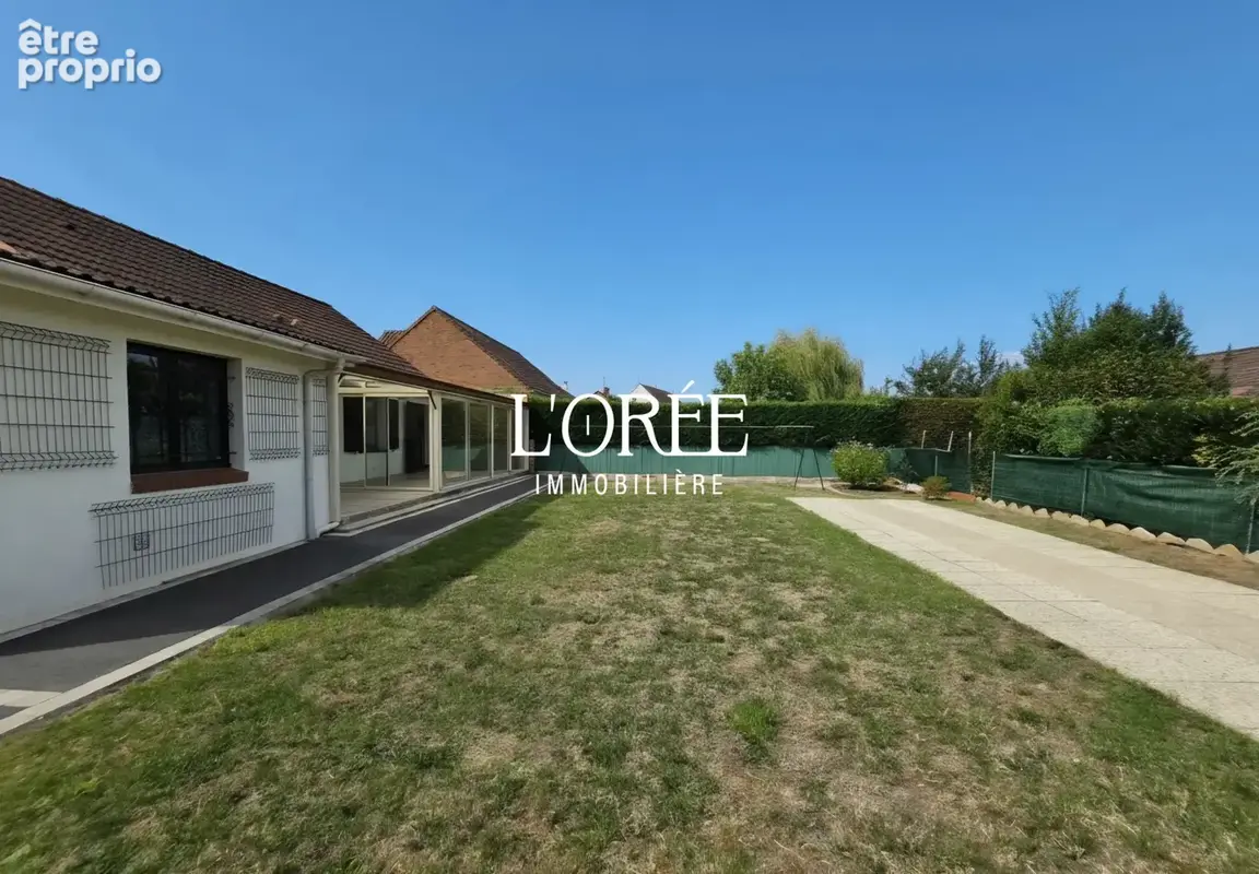 Plain pied individuel -  76m2 - 3 chambres - veranda de 20m2 - jardin - garage - photo 11