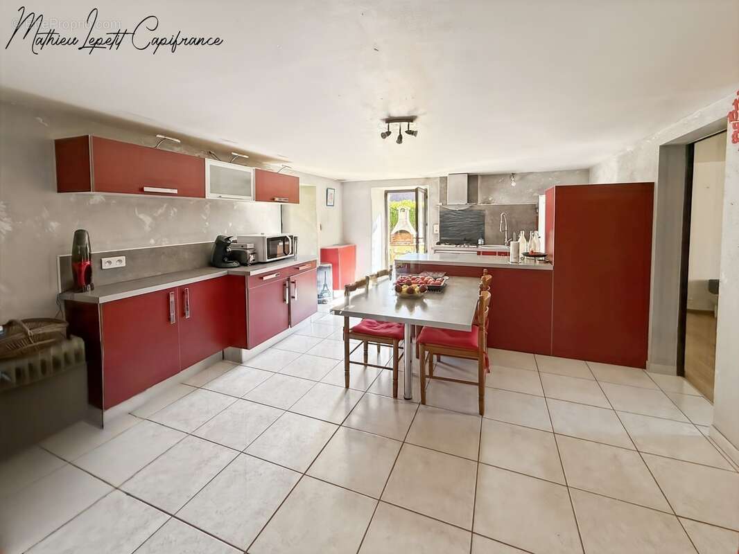 A vendre Maison en pierre de caractère de 240 m², pigeonnier, ancien séchoir à tabac et terrain clos de 2 065 m² – Lalinde 24150 - photo 8
