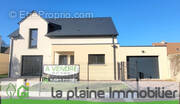 Maison à CORMELLES-LE-ROYAL