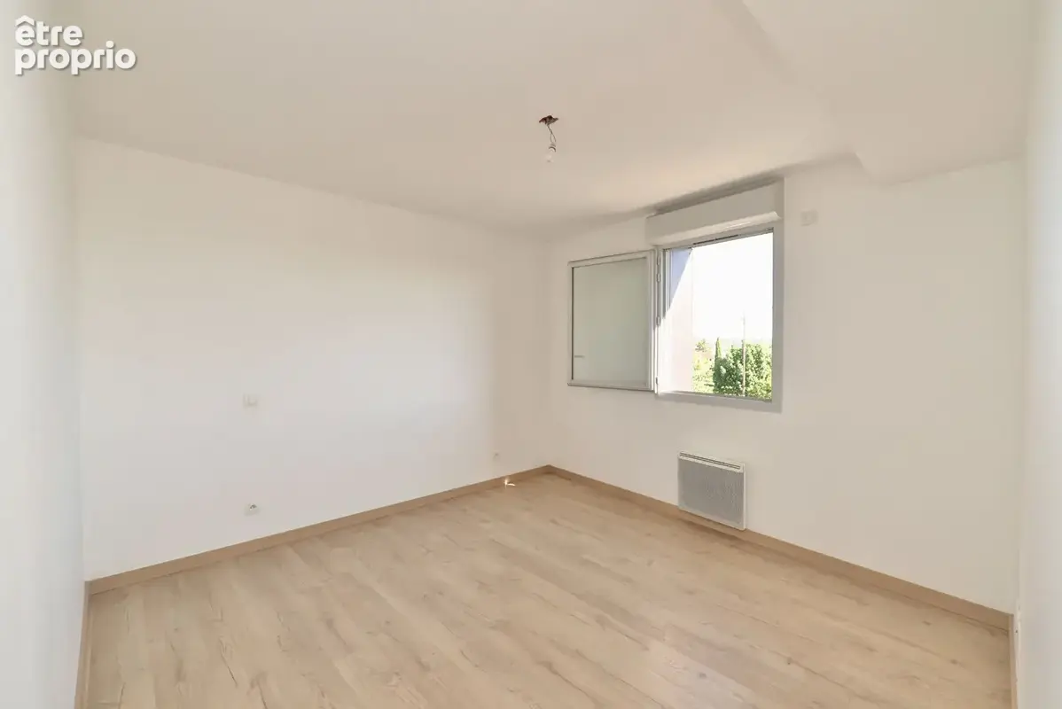 Appartement 3 pièces de 62,57 m² avec terrasse sans vis-à-vis, vue dégagée et parking en sous-sol - photo 9