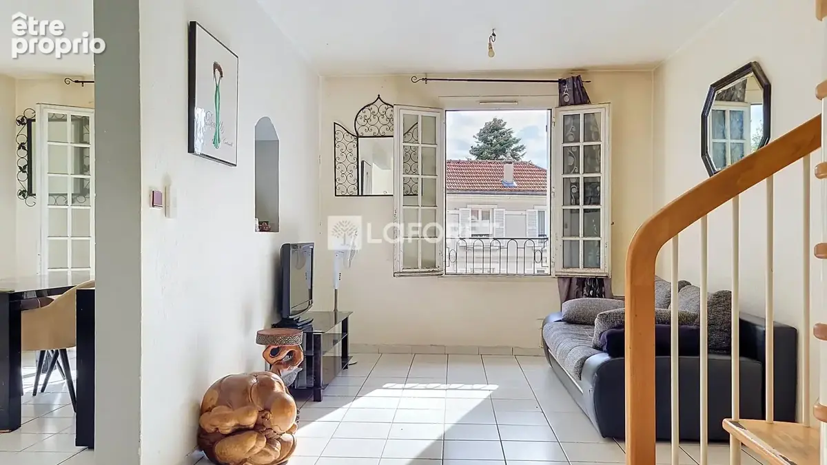 Un duplex aux volumes généreux sous les toits - photo 1