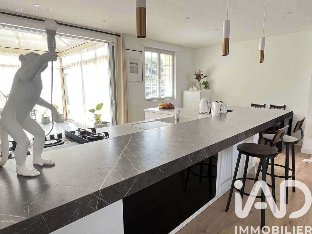 Maison 90 m² à Bouguenais  - photo 5