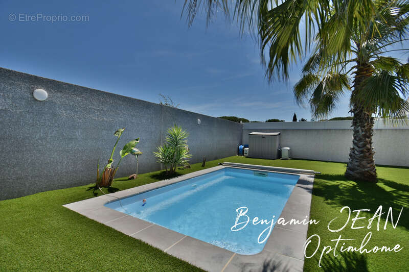 Maison récente de plain-pied avec piscine et extérieur paysagé - photo 8