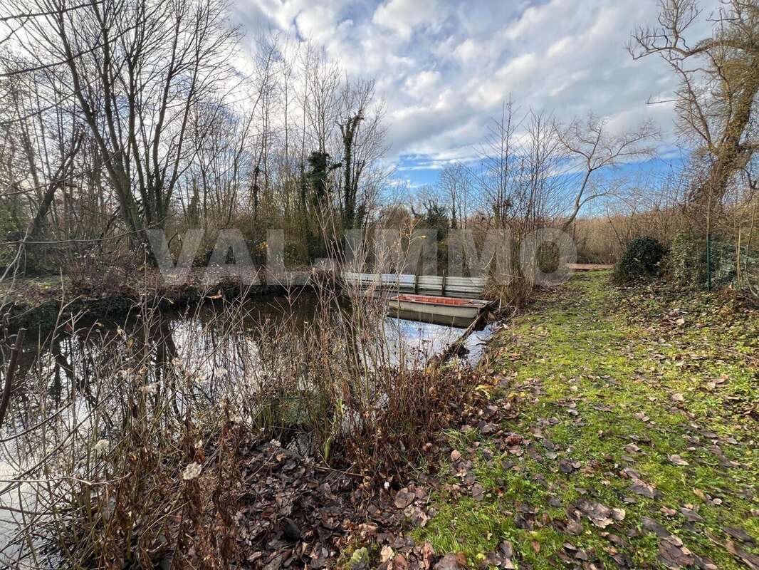 bassin - Maison à RUMAUCOURT