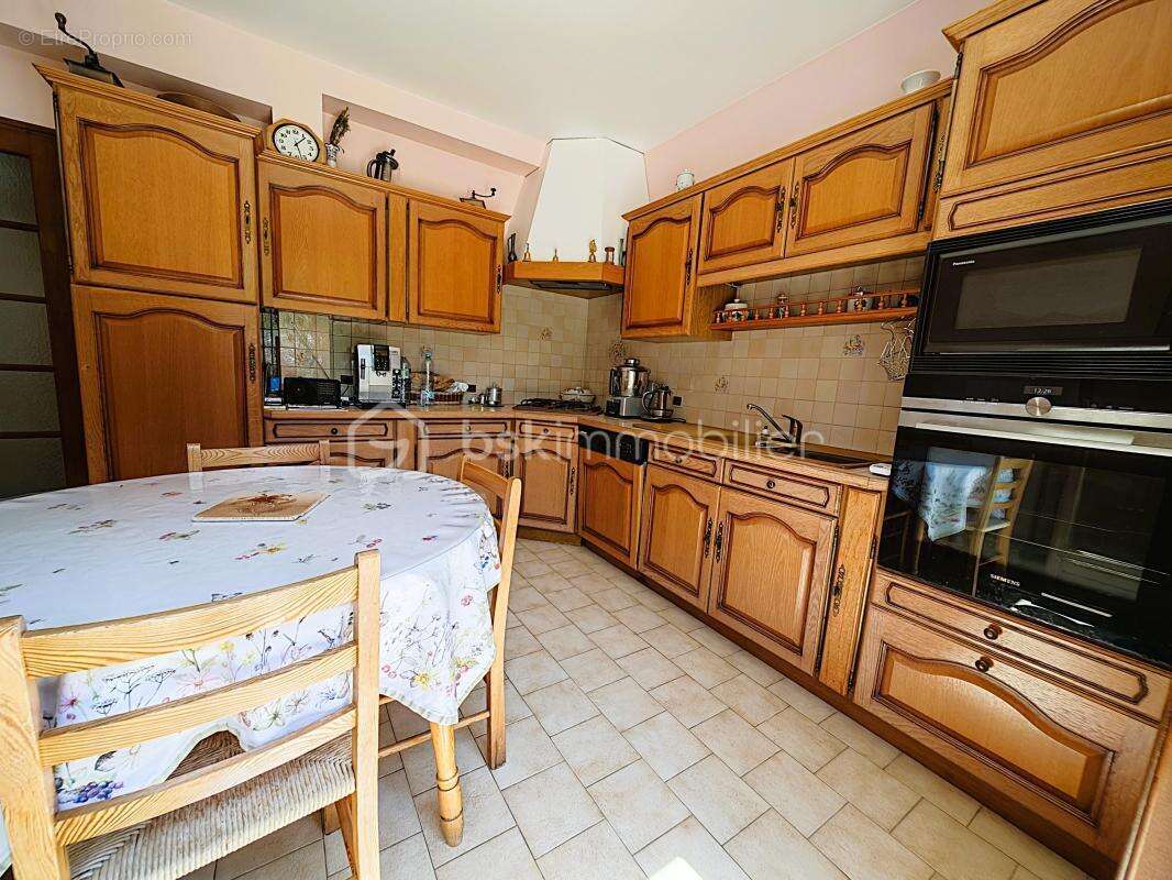 Maison 6 pièces – 143 m² – 4 chambres – Parc paysager de 1 700 m² - photo 9