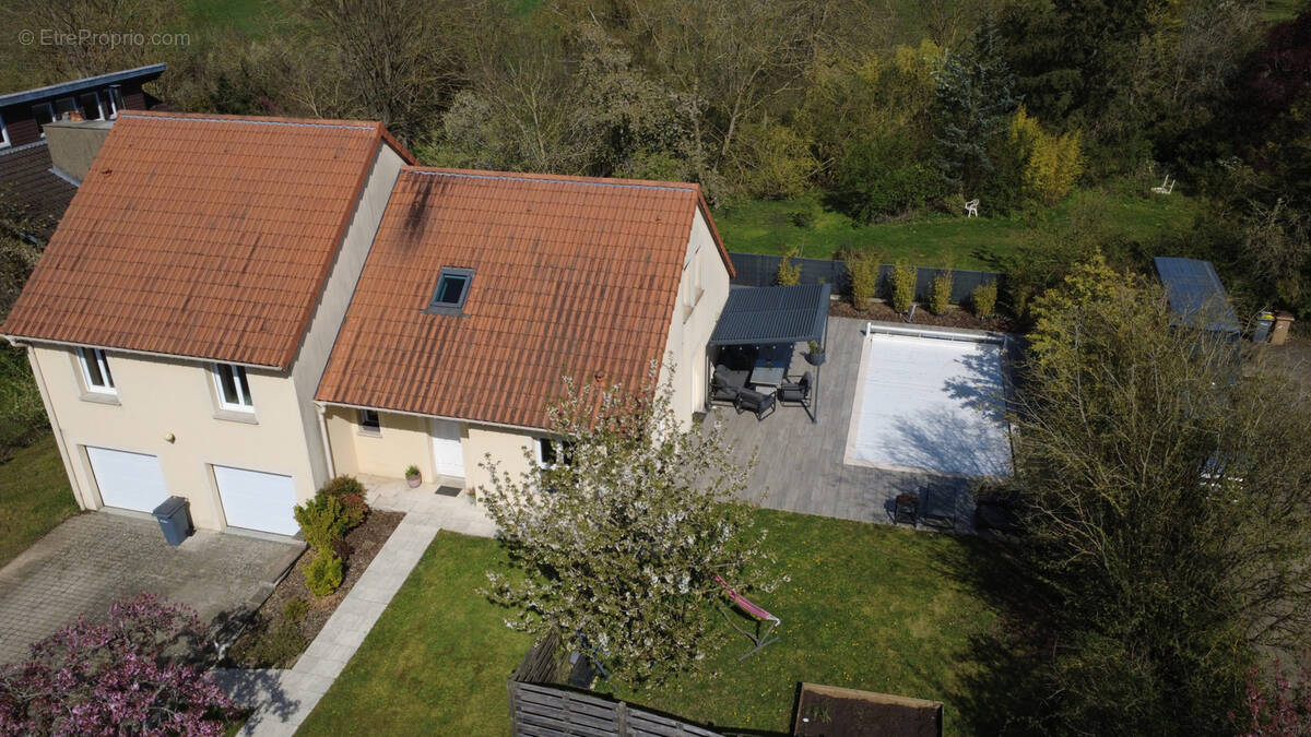 Maison à LOUVIGNY