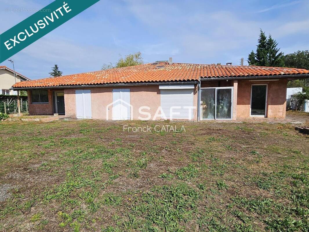 Photo 1 - Commerce à ESCALQUENS