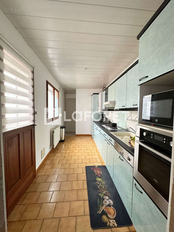 Maison à OSTRICOURT