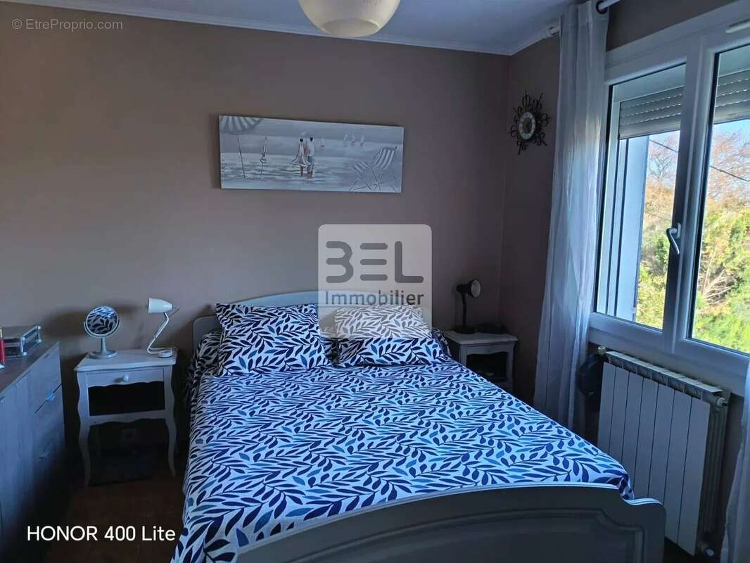 Maison à LAUDUN-L'ARDOISE