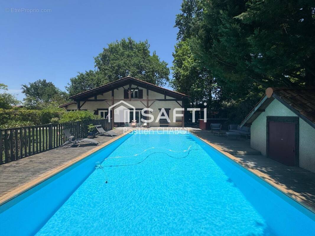 Photo 1 - Maison à SAINT-JEAN-D'ILLAC