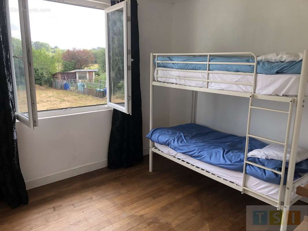 Maison sur deux niveaux proche des commodités - photo 8