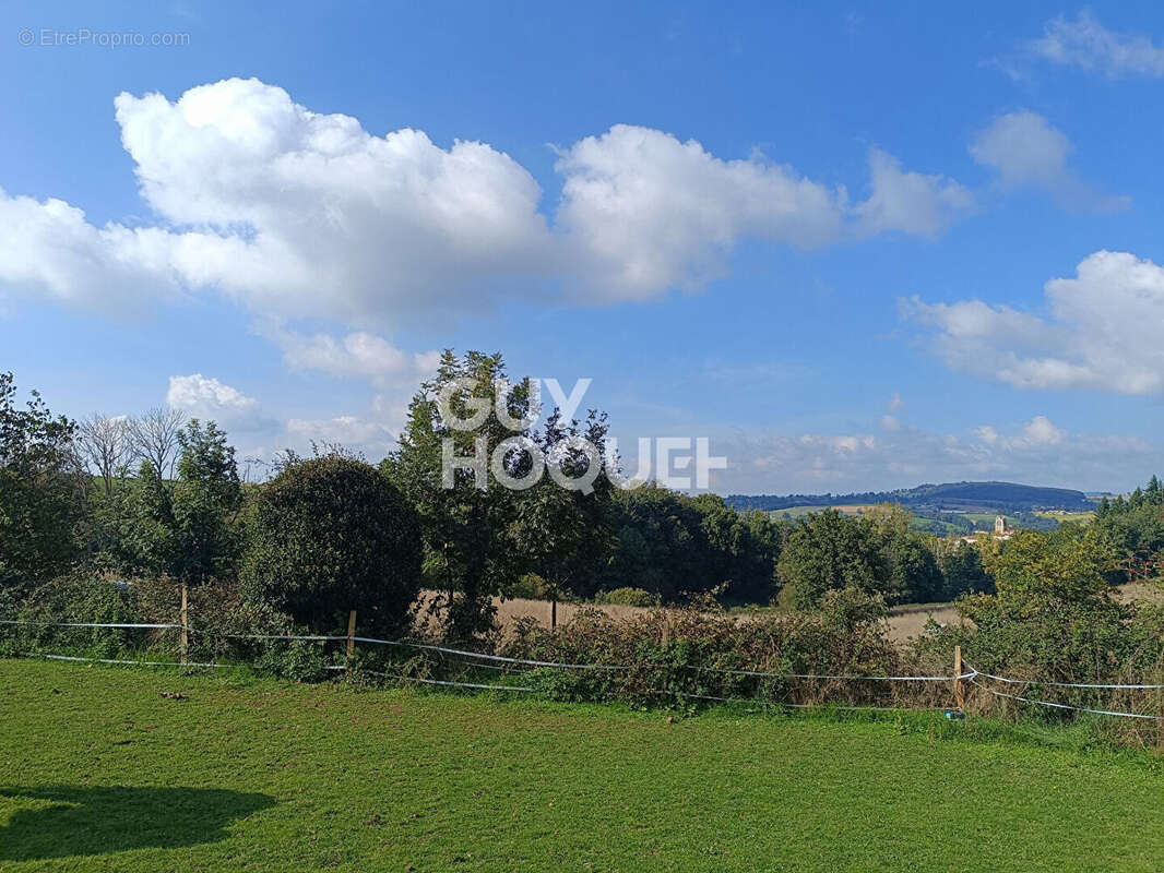 Maison à ESSERTINES-EN-DONZY