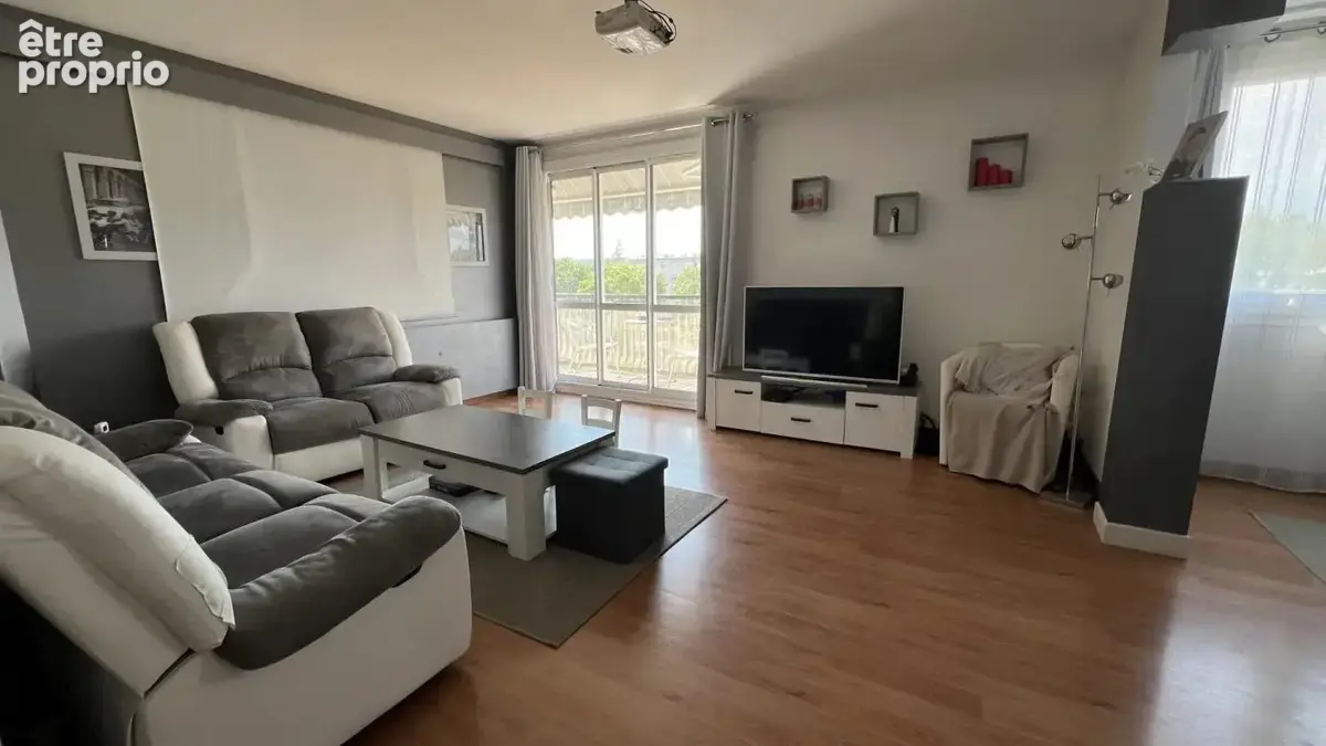 Sejour 30 m² balcon sud 3 chambres - photo 4