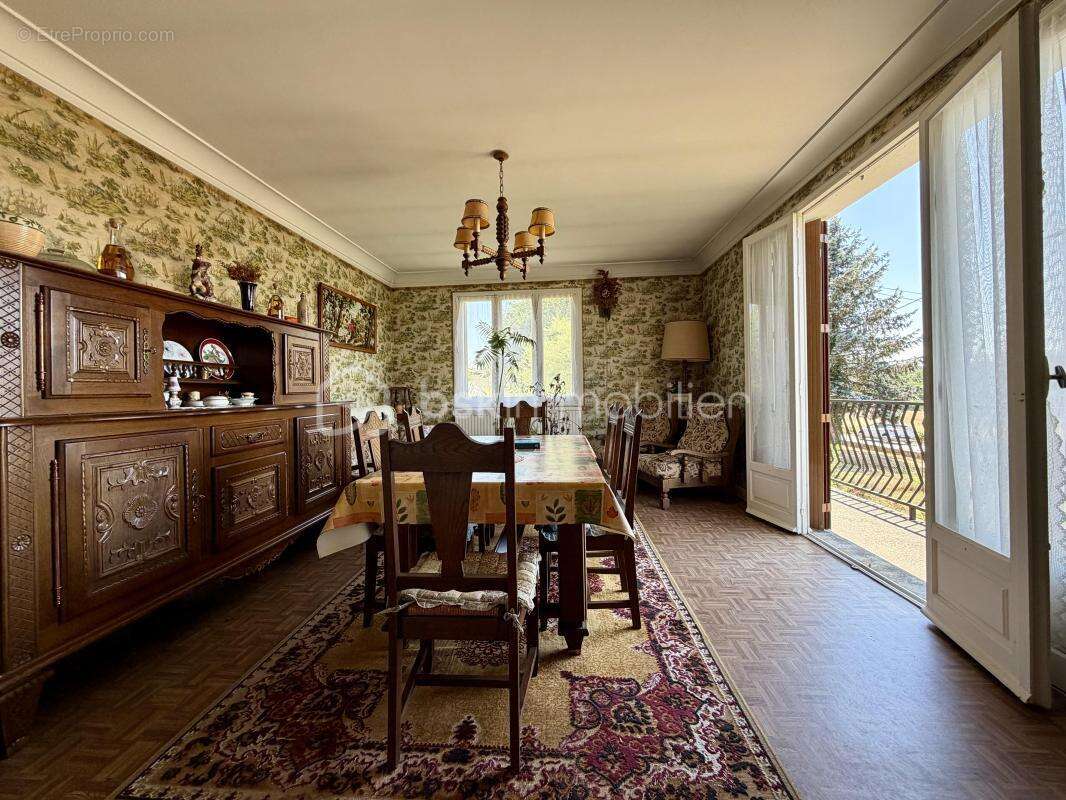 Maison élevée sur sous-sol de 152 m² - photo 2