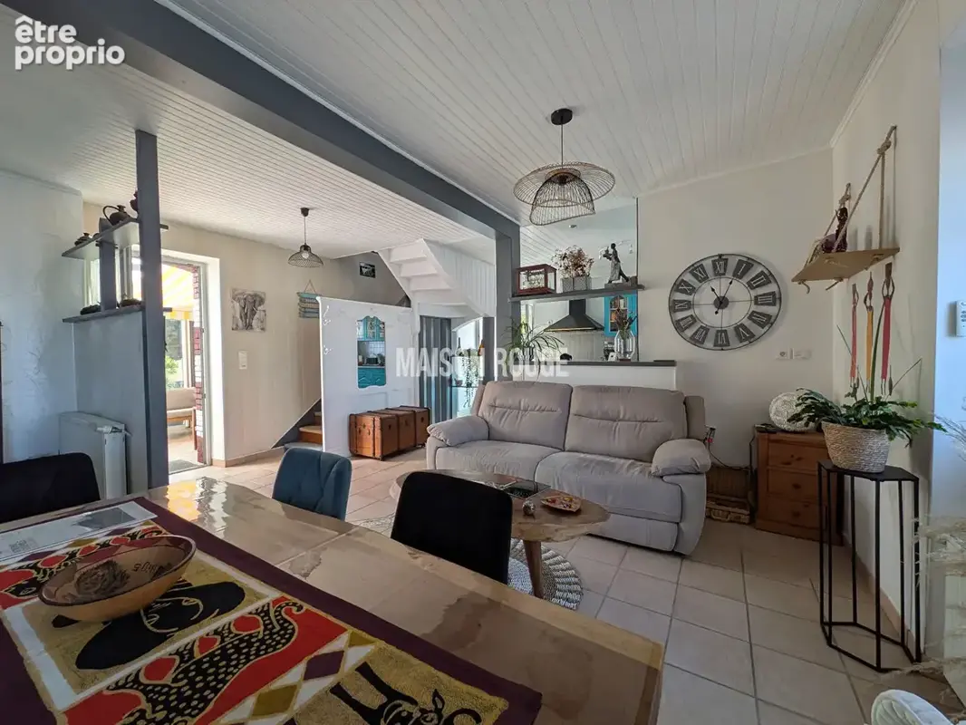 Élégante maison en pierres rénovée à Saint-Lormel avec 4 chambres et vaste terrain constructible - photo 4