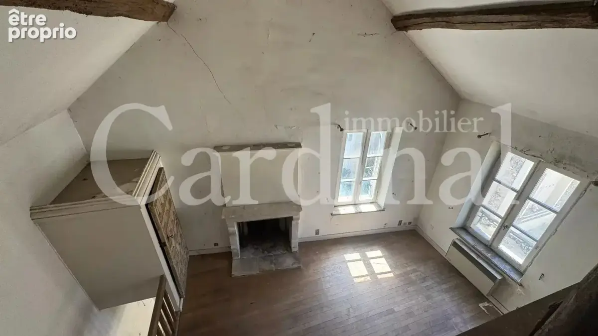 Une maison de charme à réinventer au cœur du village - photo 7