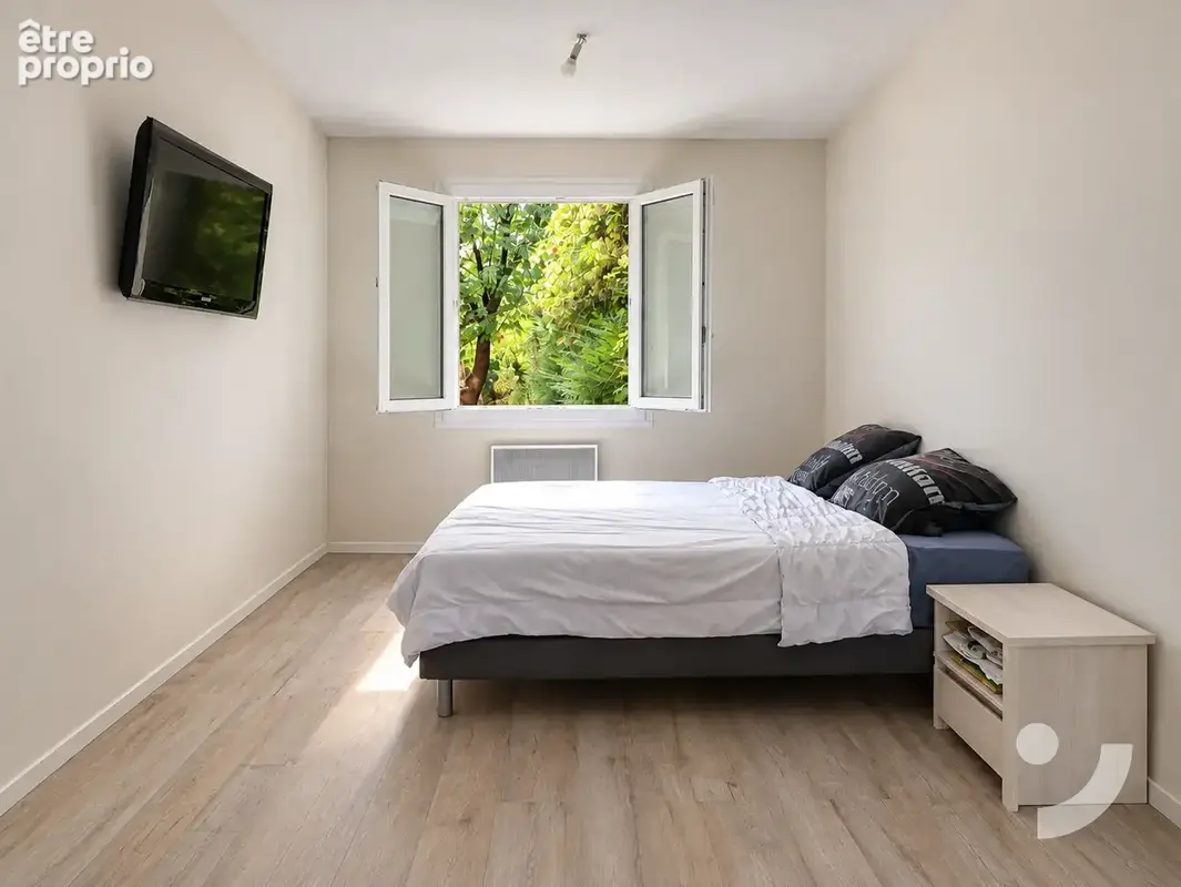Maison familiale de 187 m2 avec grand terrain, confort de plain-pied et sous-sol complet à Aÿ - photo 10