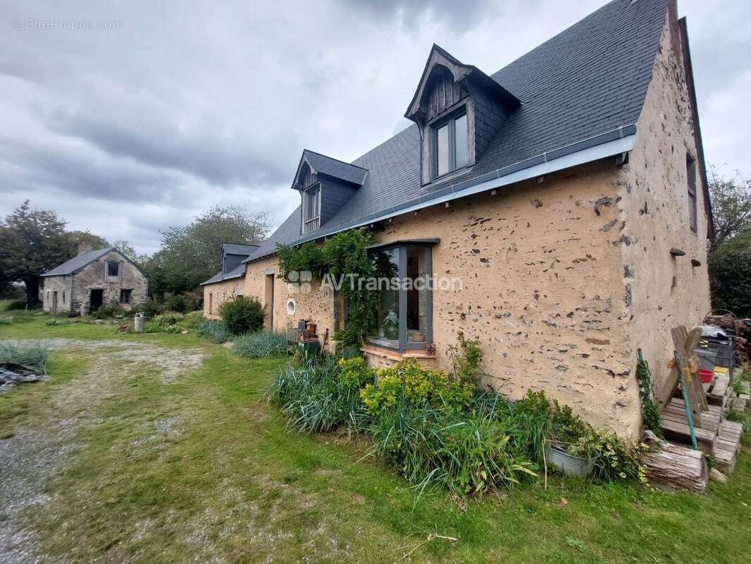 Maison à LOUVIGNE