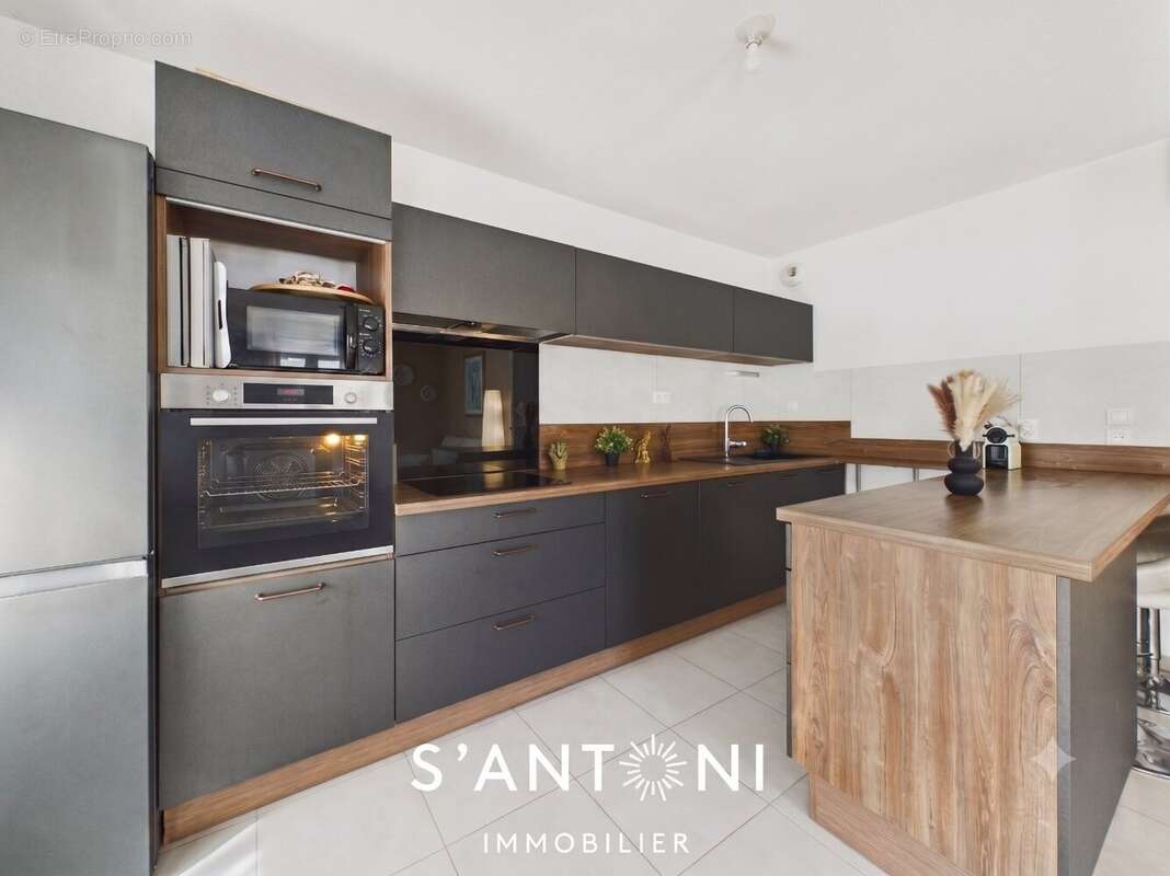 Appartement T3 de 60m² avec terrasse et jardin - photo 3