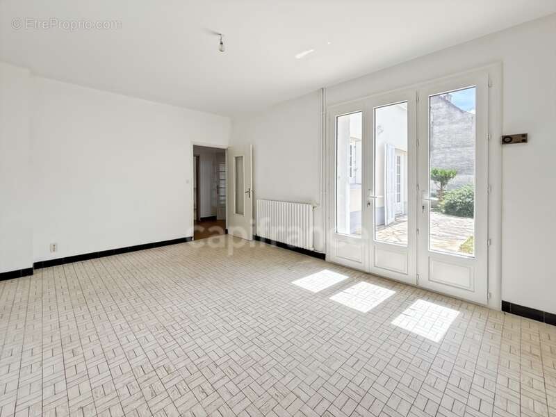 Appartement à SAVIGNE-L'EVEQUE