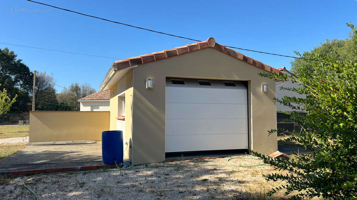 Maison Ste Foy De Peyrolieres 5 pièce(s) 112 m2 - photo 8