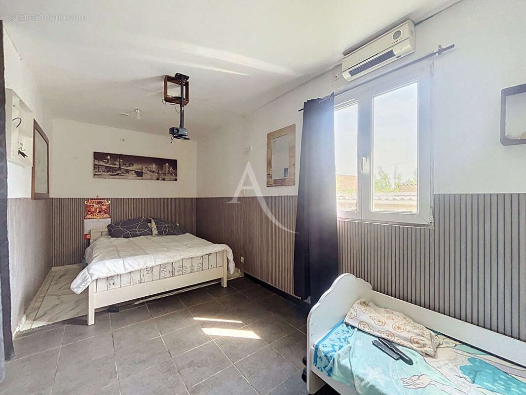 Maison de plein pied 3 chambres - photo 8