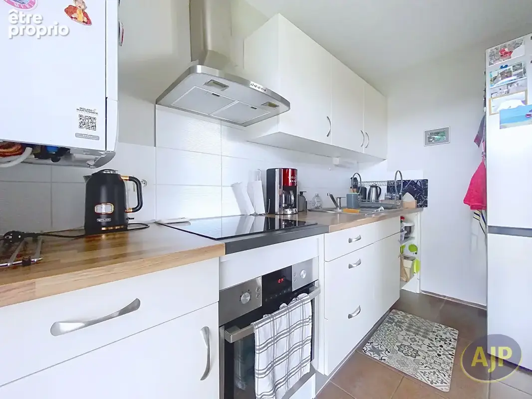 Appartement T3 avec balcon, terrasse SUD-OUEST et parking en sous-sol - photo 2