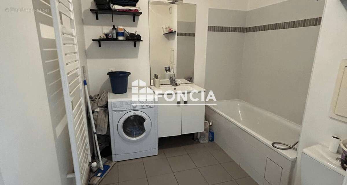 T3 56M2 Séjour, 2 chambres , balcon et place de Parking - photo 6