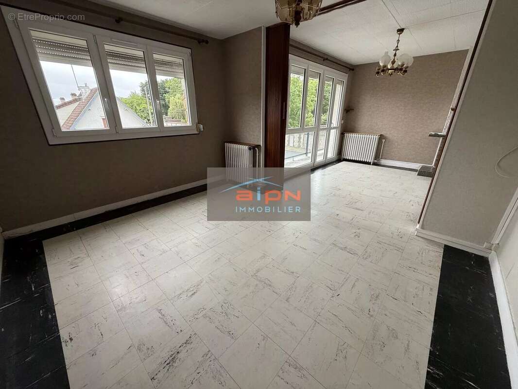Appartement t3 avec garage cave greniers - photo 2