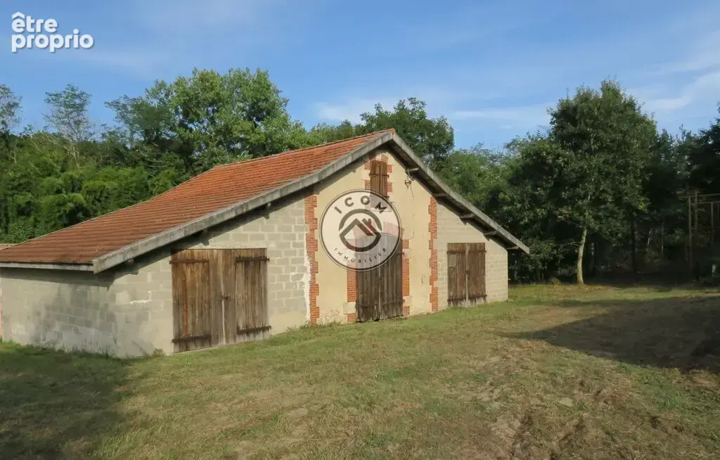 Terrain boisé de 26589 m2 avec dépendance de 120 m2 environ - photo 2