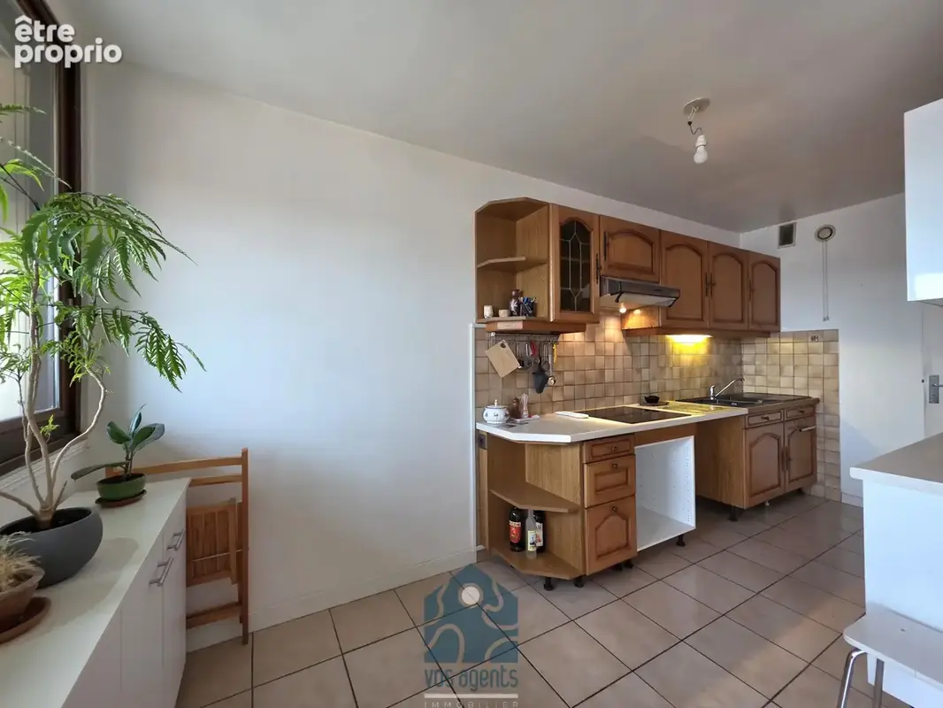 Appartement 4 pièces avec balcon, cave et stationnement couvert sécurisé - photo 5