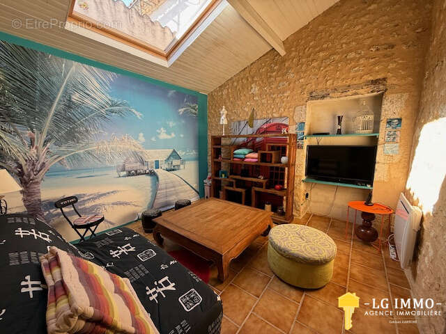 Maison 63 m2, 1 chambre, centre bourg - photo 7