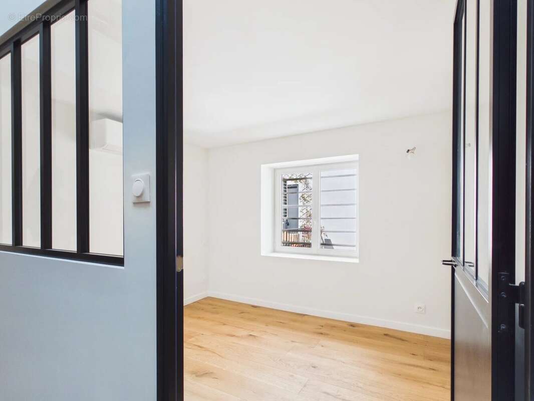 Duplex au charme historique de 102 m² - photo 7