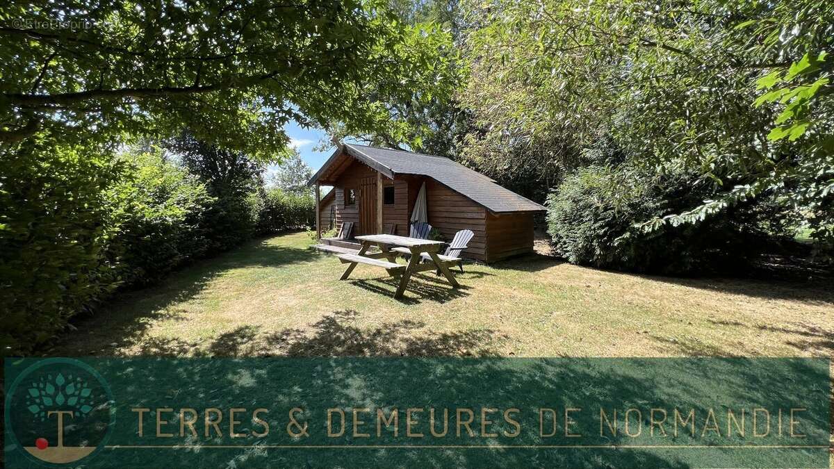 A vendre Propriété touristique de charme au cur de la campagne normande, offrant un cadre paisible et un fort potentiel d'activ - photo 3