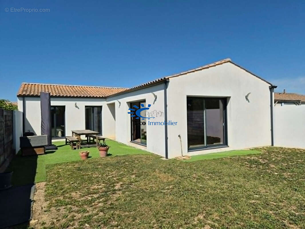 Maison plain-pied 94 m² 3 chambres garage jardin parking - photo 2
