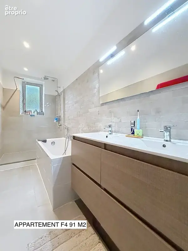 Lot de deux appartements: un f4 de 91 m2 et un f2 de 38 m2 - photo 10