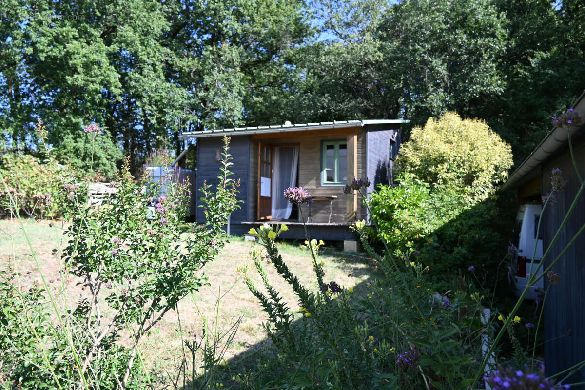 Maison bioclimatique à ossature bois avec gîte, piscine naturelle et autonomie énergétique - photo 11